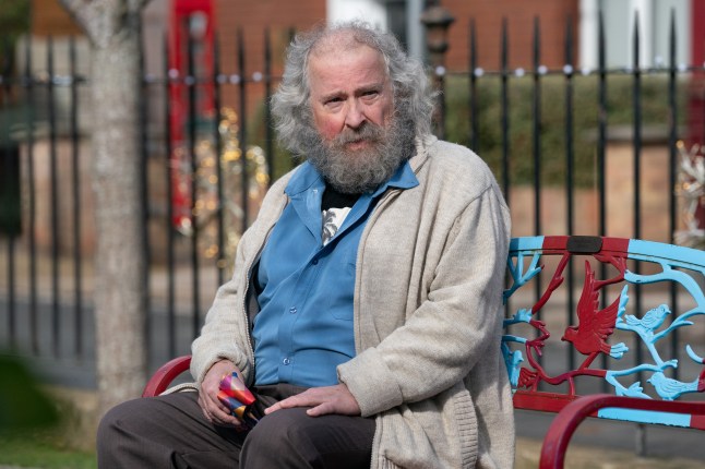 Nigel Bates in Albert Square gardens in EastEnders