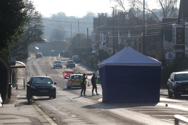 A forensic crime scene investigation tent in the middle of the road in Ilkeston, Derbyshire.