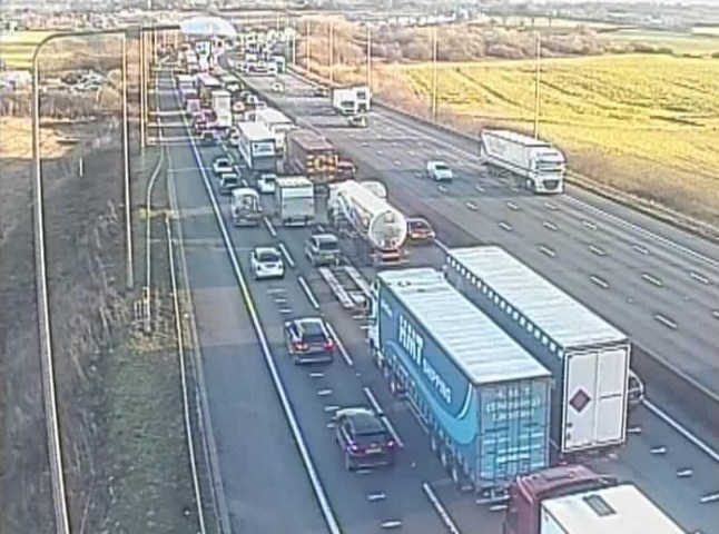 Traffic camera showing cars queueing on the M25 near Potters Bar after a crash.