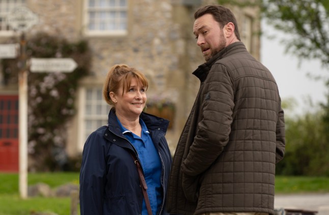 Wendy and Liam have a chat in Emmerdale village