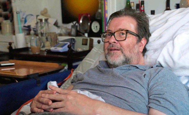 From Flicker Productions KATE GARRAWAY : DEREKS STORY Tuesday 26th March 2024, 9pm on ITV1 and ITVX Pictured: Derek at home during filming in May 2023, Following the sad loss of Derek Draper in January this year, Kate Garraway: Derek's Story, documents the final year of his life. This film follows the two previous award-winning films also made by Flicker Productions: Finding Derek and Caring for Derek. With close access to Derek and his wife, Kate Garraway, the film provides an insight into his personal struggles with illness and highlights the challenges faced by millions of people in the UK living with serious illness and disability and those who care for them. Joining Derek and Kate in May 2023, the film confronts head on the reality of Derek???s struggles and gives an unflinching view of the effect on all those around while also capturing real moments of love and joy as they spend time together as a family. With around five million unpaid carers in England and Wales, the film also highlights the