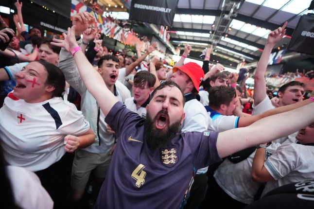 England fans react to England winning the penalties at BOXPark, Wembley, during a screening of the UEFA Euro 2024, semi final match, between England and Switzerland. Picture date: Saturday July 6, 2024. See PA Story SOCCER England. Photo credit should read: James Manning/PA Wire. RESTRICTIONS: Use subject to restrictions. Editorial use only, no commercial use without prior consent from rights holder.