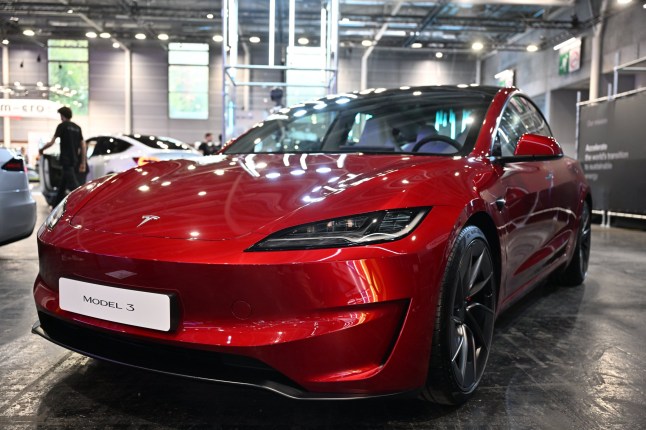 PARIS, FRANCE - OCTOBER 14: A Tesla Model 3 is on display on media day of the Mondial de l'Automobile (Paris Motor Show) at the Porte de Versailles Exhibition Center in Paris, France on October 14, 2024. (Photo by Mustafa Yalcin/Anadolu via Getty Images)