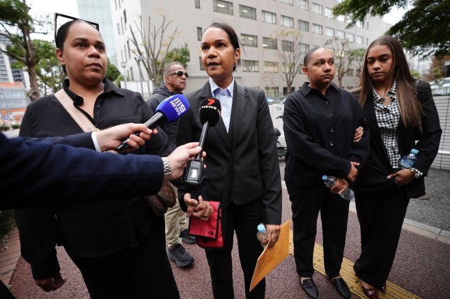 Family members of Australian citizen Donna Nelson speak to media before heading to the Chiba District Court on the opening day of the trial over Nelson for allegedly attempting to import drugs into Japan Monday, Nov. 18, 2024, in Chiba, east of Tokyo. (AP Photo/Eugene Hoshiko)