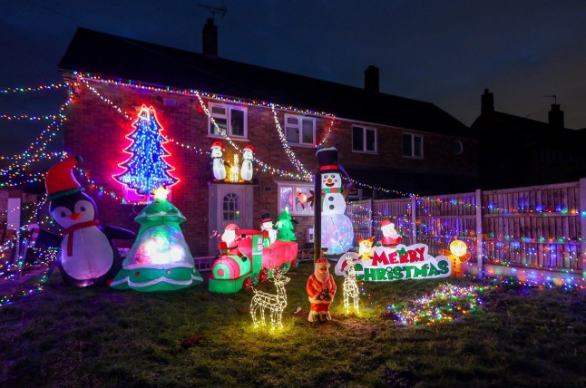 Michael Stonier outside his home in Blythe Bridge, Stoke-on-Trent, with his Christmas lights display. December 3, 2024. A family has slammed 'Scrooge' housing bosses following complaints their Christmas display is keeping residents awake and causing LIGHT POLLUTION. Each year the Stonier family turn their home into a festive winter wonderland featuring 7,000 lights and inflatables in a tradition dating back 23 years. They say delighted children flock to see the display which covers their property in Stoke-on-Trent, Staffs., after spending ??10,000 on it over the years. But Michael Stonier, 21, said he was left stunned when they got a letter from social housing bosses trying to impose restrictions on this year's lights. They said some neighbours had complained about light pollution causes by the display which was also stopping them from getting to sleep. Homes Plus Group told him they must be switched off by 10pm each night and even ordered him not to put them up too early.