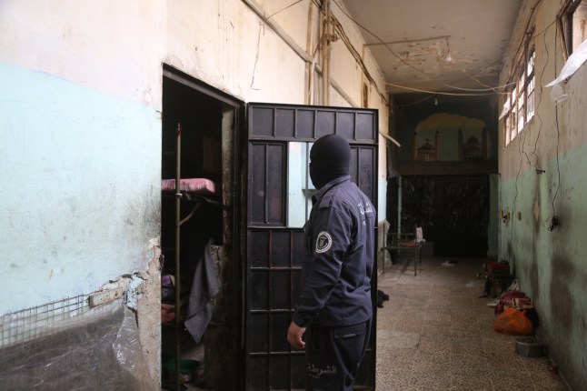 HAMA, SYRIA - DECEMBER 07: An inside view of the Hama prison after the armed groups opposed to Bashar al-Assad's regime, led by Hay'at Tahrir al-Sham (HTS), which have been fighting regime forces since Nov. 27, took control of the city center of Hama on December 07, in Syria. (Photo by Kasim Rammah/Anadolu via Getty Images)