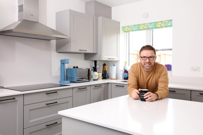 Richard Tosh at his home in St Neots Cambridgeshire. Richard and his family have recently bought the four bedroom property after returning to the UK from New Zealand.