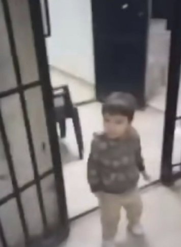 Toddler freed / re: Women and children have been freed from despot President Bashar al-Assad's 'human slaughterhouse' prison as Syrian rebels seize power of the country