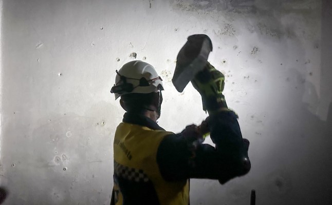 DAMASCUS, SYRIA - DECEMBER 9: Teams continue to investigate allegations of a secret compartment in Sednaya Military Prison after armed groups, opposing Syria's Bashar al-Assad regime take control in Damascus, Syria on December 9, 2024. (Photo by Bekir Kasim/Anadolu via Getty Images)