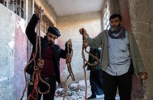 DAMASCUS, SYRIA - DECEMBER 9: People are seen at the Sednaya Military Prison after armed groups, opposing Syria's Bashar al-Assad regime take control in Damascus, Syria on December 9, 2024. (Photo by Emin Sansar/Anadolu via Getty Images)