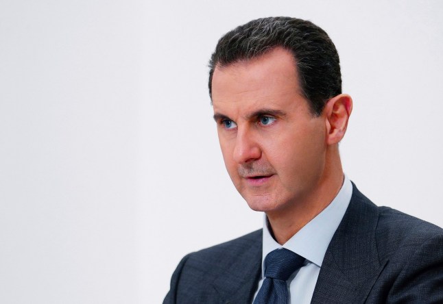 FILE - In this photo provided Nov. 9, 2019, by the official Syrian news agency SANA, Syrian President Bashar Assad speaks in Damascus, Syria. (SANA via AP, File)