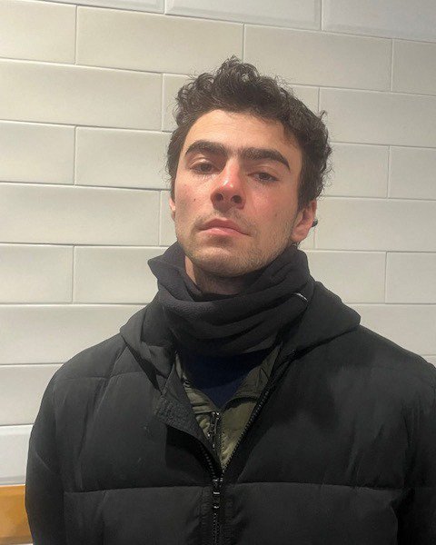 This handout picture provided by the Pennsylvania State Police Department shows Luigi Mangione, accused of gunning down a health insurance executive in New York, after his arrest in Altoona, Pennsylvania, on December 9, 2024. Mangione, 26, is accused of murdering UnitedHealthcare chief executive Brian Thompson on the streets of Manhattan last week, triggering a nationwide manhunt. He was caught on Monday after he aroused the suspicions of staff in a McDonald's restaurant in Altoona, Pennsylvania, where he fled following the brazen attack. (Photo by Handout / Pennsylvania State Police Department / AFP) / RESTRICTED TO EDITORIAL USE - MANDATORY CREDIT "AFP PHOTO / Pennsylvania State Police Department" - NO MARKETING NO ADVERTISING CAMPAIGNS - DISTRIBUTED AS A SERVICE TO CLIENTS (Photo by HANDOUT/Pennsylvania State Police Department/AFP via Getty Images)