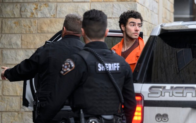 HOLLIDAYSBURG, PENNSYLVANIA - DECEMBER 10: Luigi Mangione is led into the Blair County Courthouse for an extradition hearing December 10, 2024 in Hollidaysburg, Pennsylvania. Mangione has been arraigned on weapons and false identification charges related to the fatal shooting of United Healthcare CEO Brian Thompson in New York City. Mangione is incarcerated in the State Correctional Institution in Huntingdon, Pennsylvania awaiting extradition to New York. (Photo by Jeff Swensen/Getty Images)