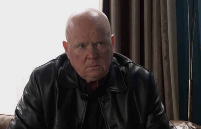 EastEnders picture shows Phil listening intently