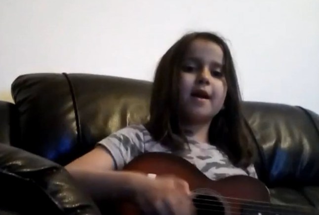 BEST QUALITY AVAILABLE Undated handout video grab image issued by Surrey Police of Sara Sharif, 10, singing and playing a guitar. Sara Sharif's father Urfan Sharif, 42, and stepmother Beinash Batool, 30, have been found guilty at the Old Bailey of the 10-year-old's murder. Her uncle Faisal Malik, 29, was found guilty of causing or allowing her death. Issue date: Wednesday December 11, 2024. PA Photo. Sara was found dead in a bunkbed at the family home in Woking, Surrey, on August 10 after Sharif called police from Pakistan and said he had beaten her up "too much". See PA story COURTS Woking. Photo credit should read: Surrey Police/PA Wire NOTE TO EDITORS: This handout photo may only be used in for editorial reporting purposes for the contemporaneous illustration of events, things or the people in the image or facts mentioned in the caption. Reuse of the picture may require further permission from the copyright holder.