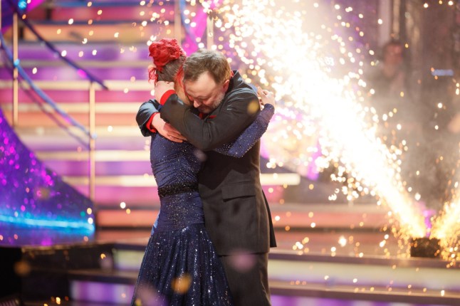 For use in UK, Ireland or Benelux countries only BBC handout photo of Dianne Buswell and Chris McCausland, during their appearance on the live show of Saturday's Strictly Come Dancing show on BBC1. Comedian Chris McCausland has become the first blind winner of Strictly Come Dancing. The BBC One dancing show saw McCausland and partner Dianne Buswell lift the glitterball trophy on Saturday following a public vote as the series celebrated 20 years on screen this year. Picture date: Saturday December 14, 2024. PA Photo. See PA story SHOWBIZ Strictly. Photo credit should read: Guy Levy/BBC/PA Wire NOTE TO EDITORS: Not for use more than 21 days after issue. You may use this picture without charge only for the purpose of publicising or reporting on current BBC programming, personnel or other BBC output or activity within 21 days of issue. Any use after that time MUST be cleared through BBC Picture Publicity. Please credit the image to the BBC and any named photographer or independent programme maker, as described in the caption.