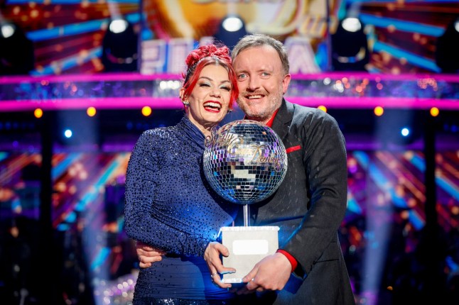 For use in UK, Ireland or Benelux countries only BBC handout photo of Dianne Buswell and Chris McCausland, during their appearance on the live show of Saturday's Strictly Come Dancing show on BBC1. Comedian Chris McCausland has become the first blind winner of Strictly Come Dancing. The BBC One dancing show saw McCausland and partner Dianne Buswell lift the glitterball trophy on Saturday following a public vote as the series celebrated 20 years on screen this year. Picture date: Saturday December 14, 2024. PA Photo. See PA story SHOWBIZ Strictly. Photo credit should read: Guy Levy/BBC/PA Wire NOTE TO EDITORS: Not for use more than 21 days after issue. You may use this picture without charge only for the purpose of publicising or reporting on current BBC programming, personnel or other BBC output or activity within 21 days of issue. Any use after that time MUST be cleared through BBC Picture Publicity. Please credit the image to the BBC and any named photographer or independent programme maker, as described in the caption.