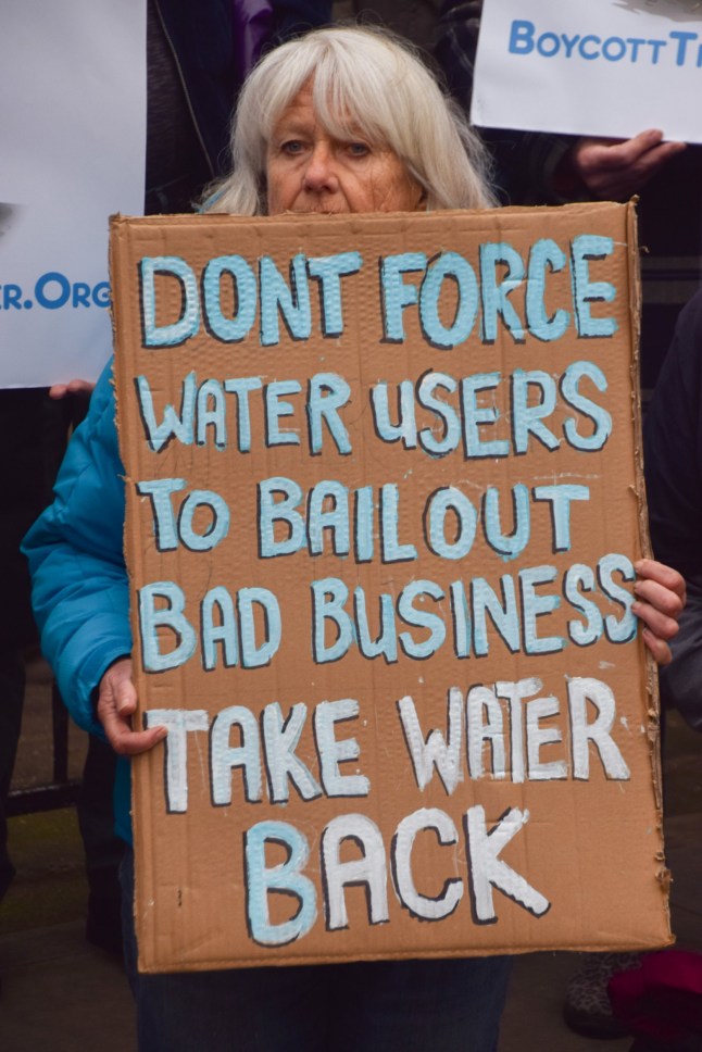 Mandatory Credit: Photo by Vuk Valcic/ZUMA Press Wire/Shutterstock (15011367c) Campaigners gather outside the Royal Courts of Justice urging the court to block the Thames Water application for a 3 billion pound bailout, which the campaigners say would cost each household 250 pounds annually. Thames Water bailout hearing at the Royal Courts of Justice, London, England, Uk - 17 Dec 2024