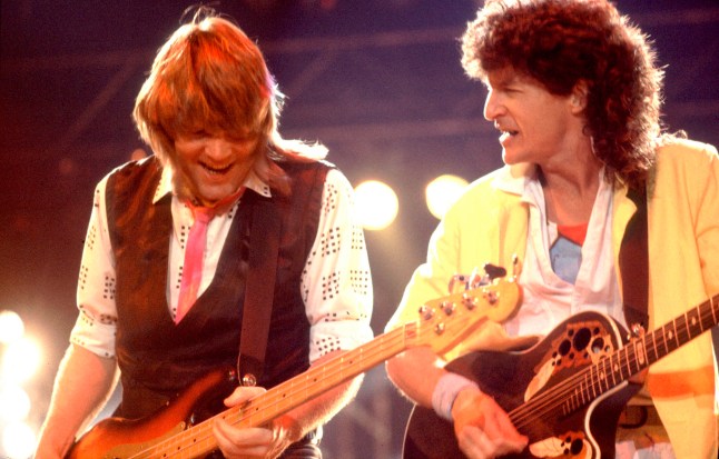 Bruce Hall and Kevin Cronin of REO Speedwagon on stage together in 1981, playing guitar