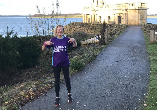 Fiona Cumberpatch pointing to a Crohn's and Colitis UK logo on her purple t-shirt