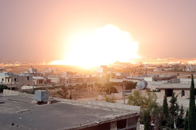 ALEPPO, SYRIA - JUNE 21: Flames rise after the war crafts belonging to the Russian army carried out phosphorus bomb attack on the Haritan town of Aleppo, Syria on June 21, 2016. (Photo by Mustafa Sultan/Anadolu Agency/Getty Images)