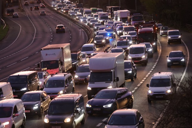 London, United Kingdom Christmas Getaway Traffic queues on the A102M Blackwall Tunnel approach in Greenwich South East London as the Christmas getaway begins. The AA has issued an amber traffic warning as people begin to make their getaway ahead of the Christmas holidays.