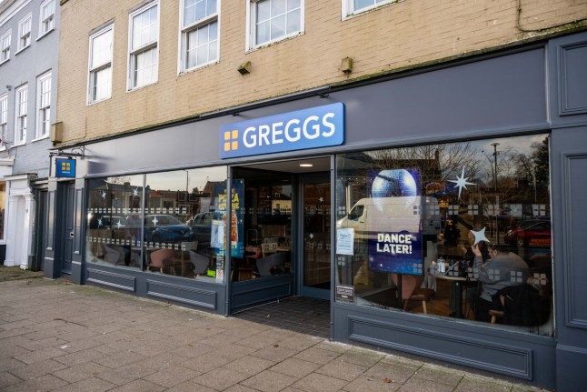 GV of Greggs in Swaffham, Norfolk. December 20, 2024. A posh market town has lost its battle to stop a Greggs' store opening on its high street. More than 1,000 residents in Swaffham, Norfolk, signed a petition and locals threatened a boycott after the chain submitted plans to move into a vacant unit. Townsfolk said big name businesses aren't welcome in the pretty high street amid fears it would kill of a popular family-run bakery. The new shop opened last month without planning permission, but locals still held out hope the local council would take enforcement action against the company. But town hall chiefs have granted the bakery giant the retrospective permission to stay open in a unit left vacant when a budget furniture store closed last year. While Greggs did not require planning permission for use of the former QD Furniture unit, the applications lodged with Breckland Council sought approval for an illuminated sign, a new air conditioning system and an outdoor seating area. It comes after Karl Chappell, a regular customer at Wellbread Bakers, launched a petition against the new Greggs store, attracting more than 1,000 signatures. Wellbread has been based in the town for several decades and loyal customers pledged to boycott the rival bakery if it opened in the town.