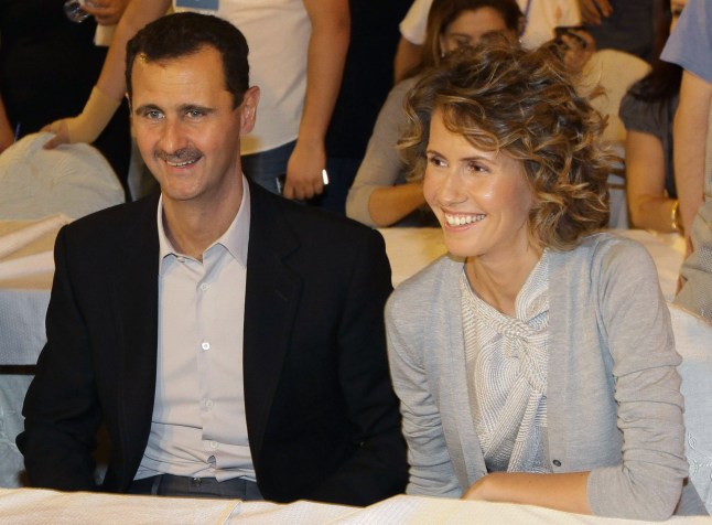 Syrian President Bashar Assad and his wife Asma visit a group of young athletes of special needs gathered at a hotel in Damascus late on September 5, 2010, ahead of the opening of the annual Middle East and North Africa Special Needs Olympics later this month. Participants from 23 countries, including Iran, will take part in the one-week tournament first launched in 1993 as of September 25, 2010. AFP PHOTO/ LOUAI BESHARA (Photo credit should read LOUAI BESHARA/AFP via Getty Images)