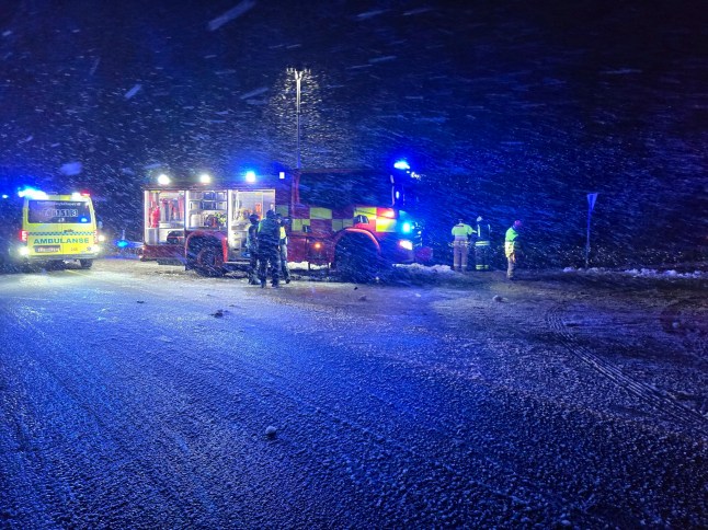 Emergency vehicles are seen at the site where a bus went off the road on the E10 in Hadsel in Nordland, Norway, Thursday Dec. 26, 2024. (Marius Birkeland/NTB Scanpix via AP)