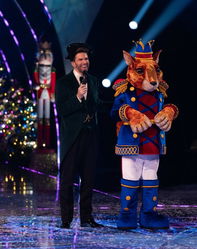 This image and the information contained herein is strictly embargoed until 20:00 Sunday 8th December 2024 From Bandicoot TV The Masked Singer Christmas Special:on ITV1 and ITVX Pictured: Joel Dommet & Nutcracker This photograph is (C) Bandicoot TV and can only be reproduced for editorial purposes directly in connection with the programme or event mentioned above, or ITV plc. This photograph must not be manipulated [excluding basic cropping] in a manner which alters the visual appearance of the person photographed deemed detrimental or inappropriate by ITV plc Picture Desk. This photograph must not be syndicated to any other company, publication or website, or permanently archived, without the express written permission of ITV Picture Desk. Full Terms and conditions are available on the website www.itv.com/presscentre/itvpictures/terms For further information please contact: michael.taiwo1@itv.com