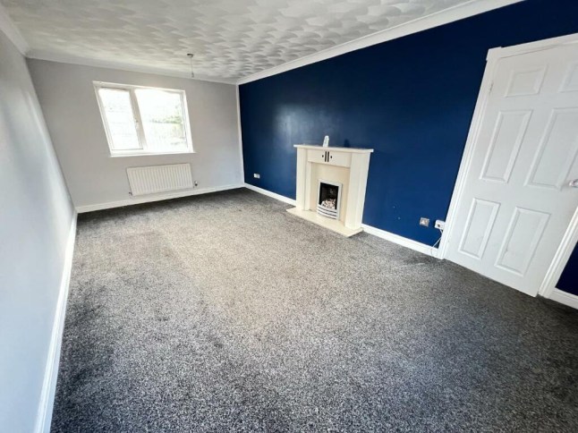 Story from Jam Press (Cheapest House Sale) Pictured: Interior of the the cheapest house in the UK?s cheapest area. The cheapest house in the UK?s cheapest area is up for sale at ?50,000 Fancy snapping up the cheapest house in the cheapest area to buy in the UK for only ?50,000? Now you can. Shildon is a small quiet town, just outside of the bustling city of Durham. And it happens to be the most affordable place to buy in Britain. A study, carried out by Zoopla, found that the price of the average home was ?73,200. Now, a two-bedroom, semi-detached house has gone on the market; for a low market tag of ?50,000, reports Luxury Property News. Currently, there are others available for just ?40,000 ? but they?re listed as an auction, meaning this is likely the starting bid amount. This property, however, is a regular chain-free sale. And the best part? It requires no renovation work. Stepping inside, there?s a spacious entrance hall, living room ? with electric fireplace ? and reasonably sized kitchen. Each room, including the bedrooms, has been fitted with new grey carpet and the walls appear to have had a fresh lick of paint. The family bathroom, however, may require some TLC; but it already hosts all the amenities. With on-street parking and the freehold included it?s an absolute steal. Just a stone?s throw away from local facilities and schools, as well as transport links into the city, it?s perfect for a young couple or family. The property, which is on the market for ?50,000 is listed with Robinsons estate agents, Bishop Auckland. ENDS