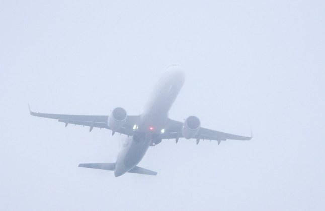 A plane takes off in foggy conditions from London Gatwick airport in Crawley, West Sussex. The murky weather has shrouded much of the country over the past few days and shows little sign of abating yet. In some areas, thick fog patches could reduce visibility down to just 100 metres overnight and into Saturday, the Met Office said. Picture date: Saturday December 28, 2024. PA Photo. Photo credit should read: Gareth Fuller/PA Wire