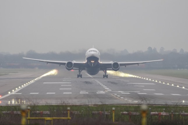 A plane takes off in misty conditions from London Gatwick airport in Crawley, West Sussex. The murky weather has shrouded much of the country over the past few days and shows little sign of abating yet. In some areas, thick fog patches could reduce visibility down to just 100 metres overnight and into Saturday, the Met Office said. Picture date: Saturday December 28, 2024. PA Photo. Photo credit should read: Gareth Fuller/PA Wire