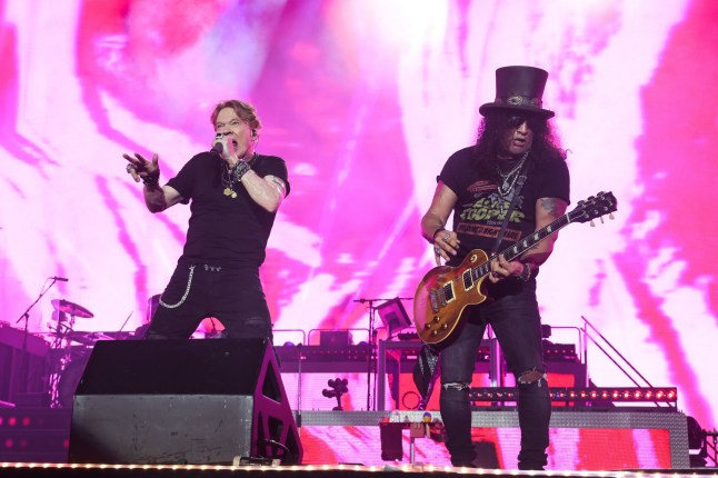 (L-R) Axl Rose and Slash of Guns N' Roses perform onstage