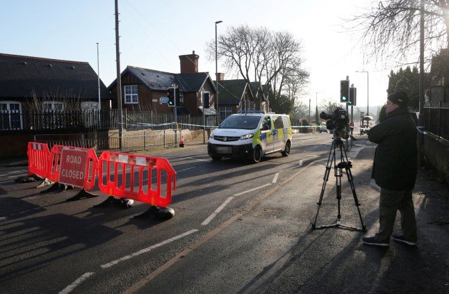 A police car at a cordon in Ilkeston, Derbyshire, where an 18-year-old man was stabbed to death.