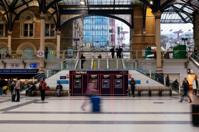 Automated teller machines (ATMs), operated by Natwest Group Plc, at London Liverpool Street railway station in London, UK, on Monday, Oct. 21, 2024. The trio of UK banks reporting this week Lloyds Banking Group Plc, NatWest Group Plc and Barclays Plc should be shielded by combined structural hedges of almost????700 billion??that reduce their sensitivity to rate cuts. Photographer: Jose Sarmento Matos/Bloomberg via Getty Images