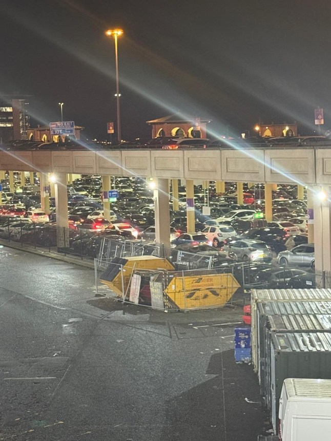 Children were left crying as fights broke out at the Trafford Centre with motorists stuck in the car park for up to FIVE HOURS. Shoppers said yesterday's (Dec 30) traffic chaos was so bad that some cars were unable to even leave the spaces in which they had parked. Caption: Traffic chaos at the Trafford Centre in Trafford Park, Greater Manchester, on 30 December 2024