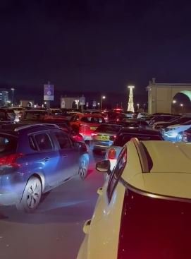 Children were left crying as fights broke out at the Trafford Centre with motorists stuck in the car park for up to FIVE HOURS. Shoppers said yesterday's (Dec 30) traffic chaos was so bad that some cars were unable to even leave the spaces in which they had parked. Caption: Traffic chaos at the Trafford Centre in Trafford Park, Greater Manchester, on 30 December 2024