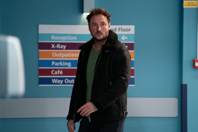 Martin rushing down the hospital corridor in EastEnders