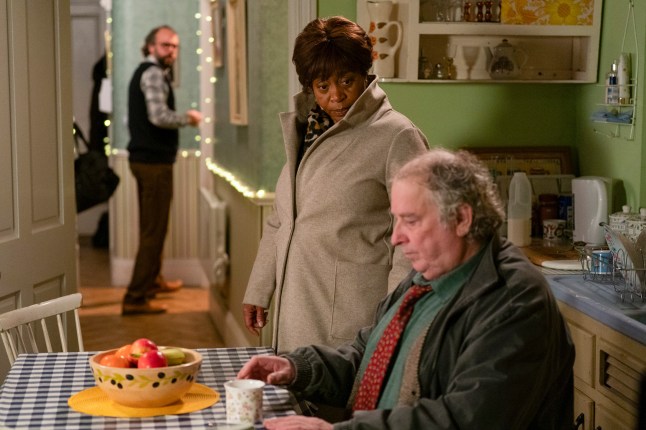 Yolande talks to Nigel in EastEnders as Reiss watches on