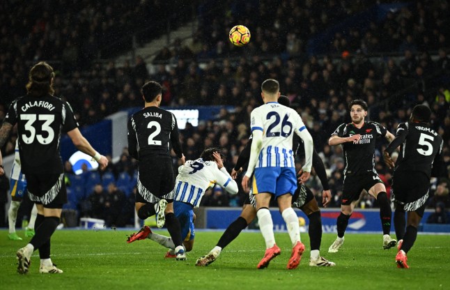 Soccer Football - Premier League - Brighton & Hove Albion v Arsenal - The American Express Community Stadium, Brighton, Britain - January 4, 2025 Arsenal's William Saliba fouls Brighton & Hove Albion's Joao Pedro to concede a penalty REUTERS/Dylan Martinez EDITORIAL USE ONLY. NO USE WITH UNAUTHORIZED AUDIO, VIDEO, DATA, FIXTURE LISTS, CLUB/LEAGUE LOGOS OR 'LIVE' SERVICES. ONLINE IN-MATCH USE LIMITED TO 120 IMAGES, NO VIDEO EMULATION. NO USE IN BETTING, GAMES OR SINGLE CLUB/LEAGUE/PLAYER PUBLICATIONS. PLEASE CONTACT YOUR ACCOUNT REPRESENTATIVE FOR FURTHER DETAILS..