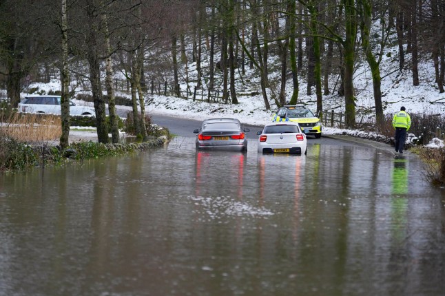 Cars stuck in flood water near Bakewell, Derbyshire. January 6 2025.