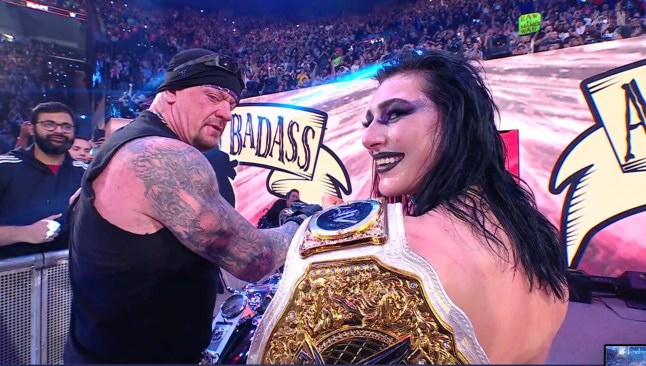 The Undertaker and Rhea Ripley pose together during the WWE Raw debut on Netflix