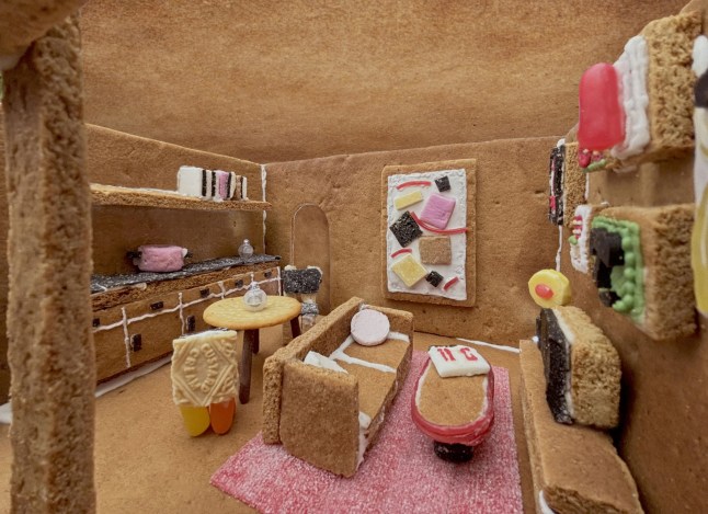 Story from Jam Press (Dream Biscuit House) Pictured: Inside Ali and Laura?s miniature dream flat made out of biscuits. Couple told 'stop spending money on oat flat whites' to buy a house hit back by designing their dream flat out of BISCUITS A couple who can?t afford London property prices have crafted their own miniature flat out of biscuits. Ali Munro, 30 and Laura Casey, 31, live in the capital where the average home has an eye-watering price tag of ?687,238, according to Rightmove. Fed up with extortionate prices, the creative professionals decided to take a stand by building their own bricks and mortar ? out of biscuits. The tiny baked home, which has 11,000 likes on Reddit, includes everything from bespoke art pieces to a double bed complete with marshmallow pillows. There are also colourful ?towels? ? made from sugary sweets ? hanging on the bathroom rack. ?We've been experiencing the effects of the housing crisis first-hand,? Ali told What's The Jam. ?And [we] wanted to make something that draws attention to this issue in an accessible and slightly satirical way. ?A project of a highly detailed [biscuit] house seemed like a good way to use our aligned skill sets as a creative and a designer.? Ali and Laura hope their biscuit digs will create a discussion that could influence the government to act. They said: ?We'd love to see more genuinely affordable houses being built and stricter regulations on buying as an investment. ?We know the housing crisis is complicated but we'd welcome any action that contributes to levelling prices. ?Sometimes certain people of our parents' generation make comments about how if only young people learnt to be more frugal and stopped spending money on oat flat whites and streaming subscriptions they'd be able to buy a house. ?But when the average property price is over 12 times your yearly salary, this argument simply becomes futile. ?Whilst it [our biscuit house] is hopefully beautiful and interesting to look at as a piece of craft, it's also meant to be a sad reminder of the deeply troubling housing crisis we're all in.? The house cost them just ?30 to make including the biscuit walls, sweets, chocolates and icing. But there is one issue when you design a home out of such delicious materials. They said: ?It's been hard not to continually snack on the construction materials.? Online users have loved their creation. One person said: ?That's ruddy brilliant!? Another said: ?Gonna need some dough to live there.? Someone joked? ?That?ll be ?2500pcm. Bills not included.? One user said: ?This looks like a Barbican flat. Perfection.? One person added: ?So sweet? yet so sad at the same time?? ENDS EDITOR?S NOTE: Please note the case studies have declined to be pictured.