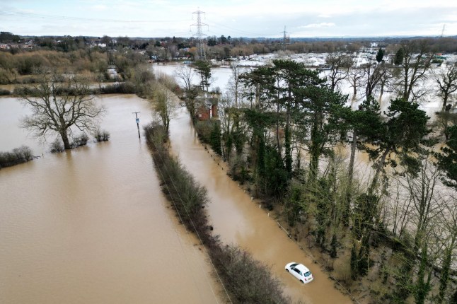 A photograph taken on January 7, 2025 shows an aerial view of flooded streets and fields, in Quorn, central England, after heavy snow and rain across large parts of England caused disruption over the weekend. (Photo by Oli SCARFF / AFP) (Photo by OLI SCARFF/AFP via Getty Images)