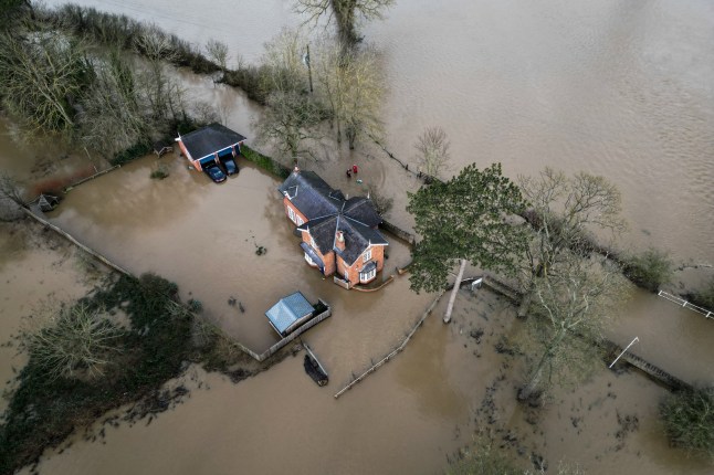 A photograph taken on January 7, 2025 shows an aerial view of flooded streets and fields, in Quorn, central England, after heavy snow and rain across large parts of England caused disruption over the weekend. (Photo by Oli SCARFF / AFP) (Photo by OLI SCARFF/AFP via Getty Images)