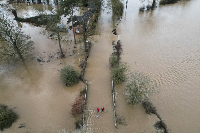 A photograph taken on January 7, 2025 shows an aerial view of flooded streets and fields, in Quorn, central England, after heavy snow and rain across large parts of England caused disruption over the weekend. (Photo by Oli SCARFF / AFP) (Photo by OLI SCARFF/AFP via Getty Images)