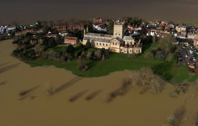 A drone view shows floodwater around Tewkesbury Abbey, in Tewkesbury, Britain, January 7, 2025. REUTERS/Toby Melville