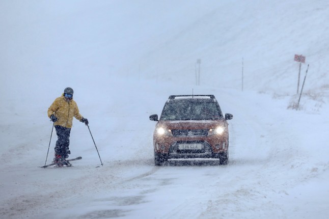 GLENSHEE, SCOTLAND - JANUARY 07: Skier seen at Glenshee Ski Centre on January 07, 2025 in Glenshee, United Kingdom. The Met Office has issued weather warnings as a cold snap sweeps across the UK, bringing bouts of ice, snow, and rain. (Photo by Jeff J Mitchell/Getty Images)