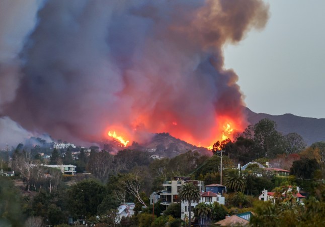 Smoke and flames from the Palisades Fire